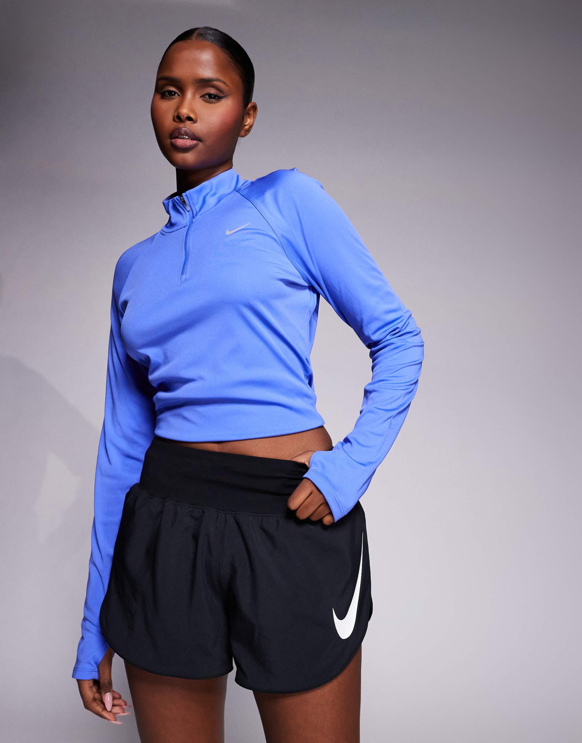 nike tempo running shorts with swoosh detail in black