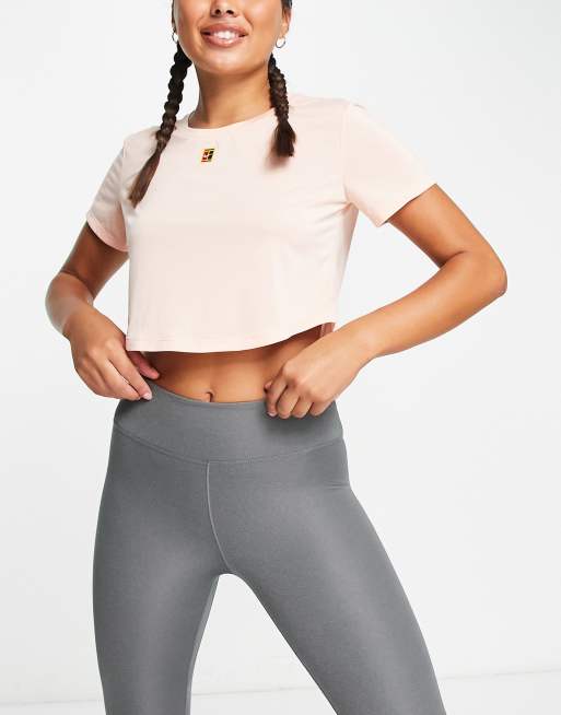 Rondsel spanning trimmen Nike Tennis Dri-FIT Heritage top in pink | ASOS