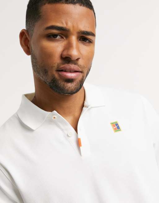 Nike Tennis heritage polo shirt in white | ASOS