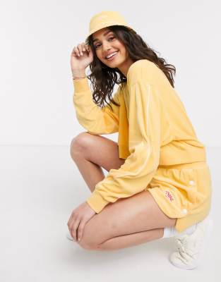 Nike terry towelling shorts in yellow 