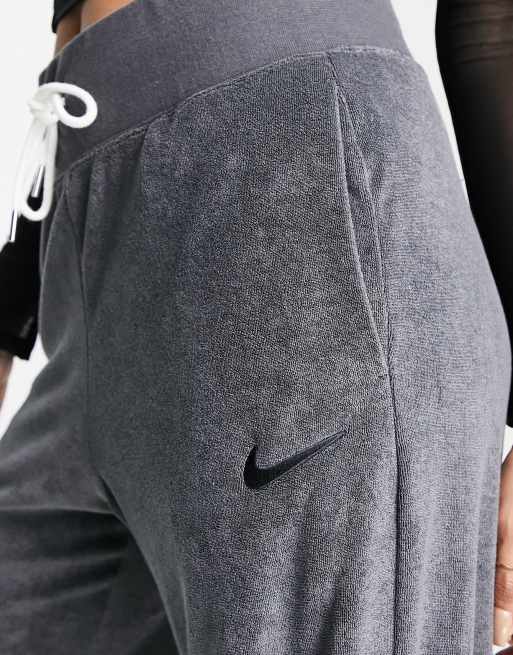 Nike straight best sale leg pants