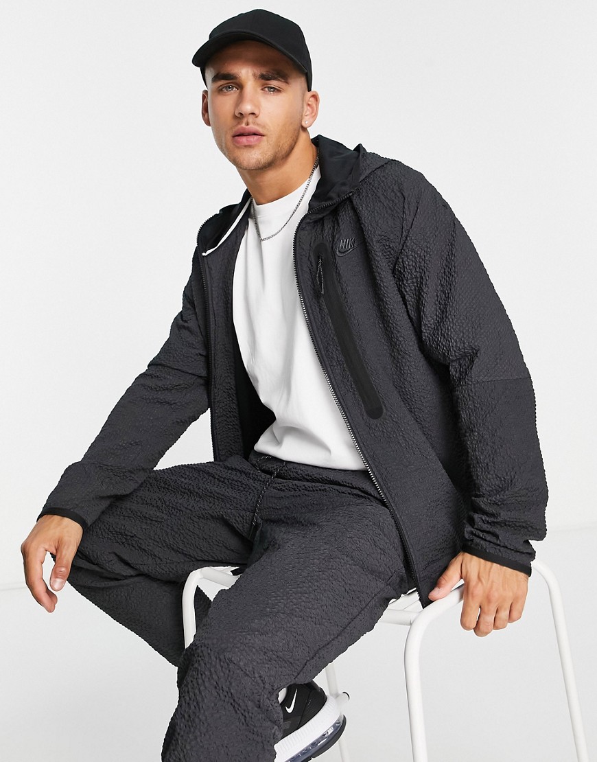 Nike Textured Tech Fleece Woven Zip Thru Jacket In Black