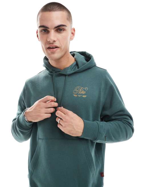 Nike 'Tis The Season logo hoodie in dark green ASOS