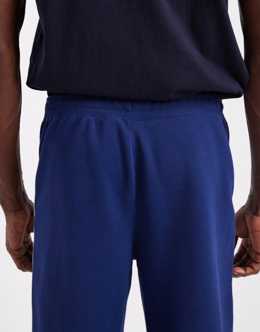 Nike - Toelopende joggingbroek met strepen in marineblauw, 5 van 5