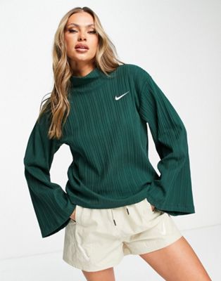 Nike - Top en jersey côtelé à manches longues et petit logo virgule - Vert Pro | ASOS