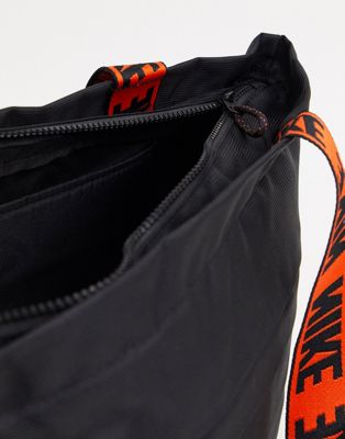 nike tote bag in black with orange taping strap