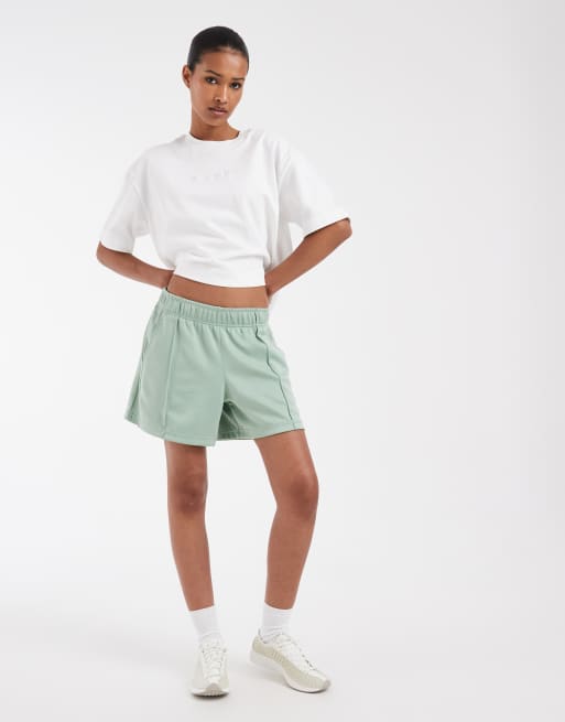 Nike track shorts in light green , 2 of 5