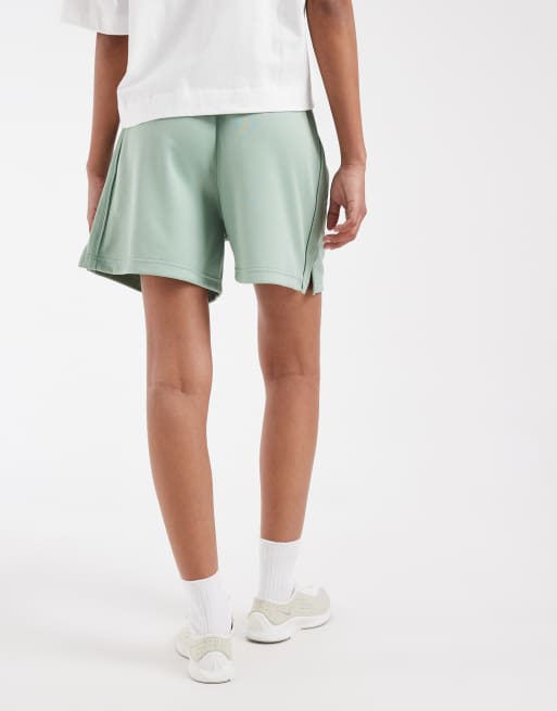 Nike track shorts in light green , 4 of 5