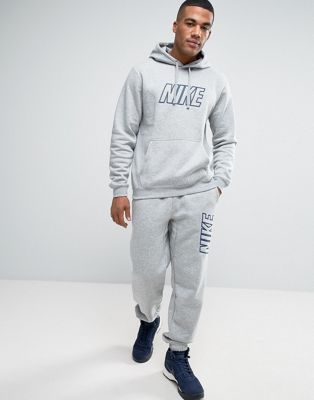 grey and blue nike tracksuit