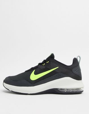 black and green nike trainers