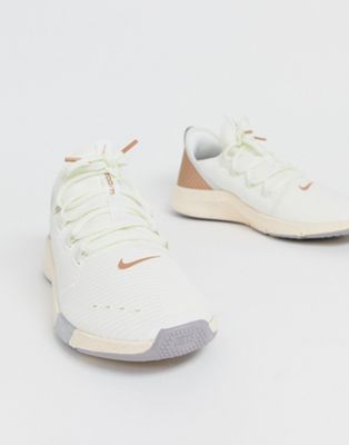 nike training air zoom fearless sneakers in rose gold