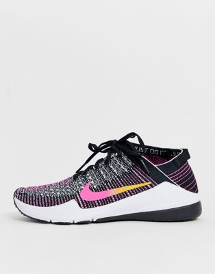 nike training air zoom fearless trainers in black and orange