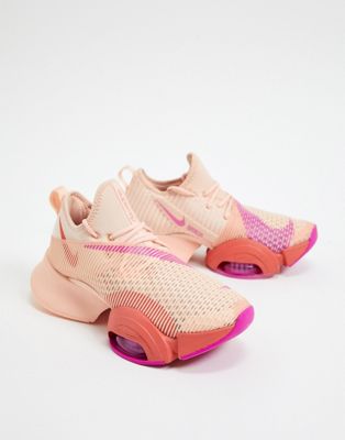 nike training air zoom superrep trainers in rose gold and burgundy