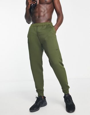 Nike Training Axis Therma-FIT ADV joggers in khaki - ASOS Price Checker