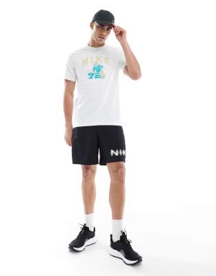 NIKE BLURRED SWOOSH GRAPHIC 7 INCH SHORTS