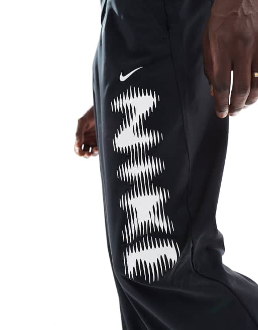 Nike Training blurred swoosh graphic sweatpants in black, 2 of 5