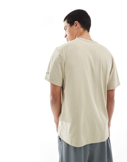 Nike Training blurred swoosh graphic t-shirt in beige
