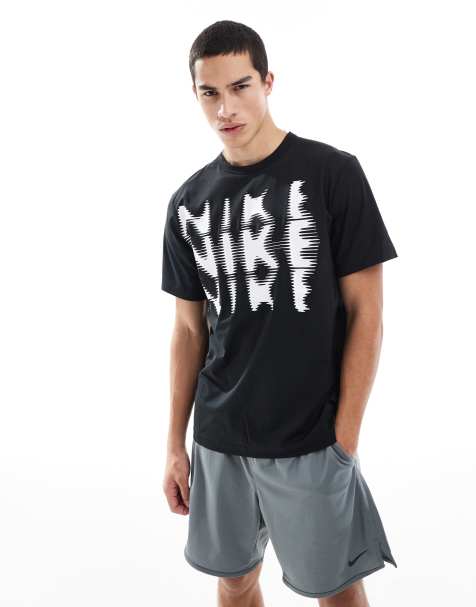 Nike Training blurred swoosh graphic T-shirt in black - view 1