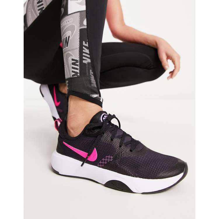 Black nike trainers shop with pink tick