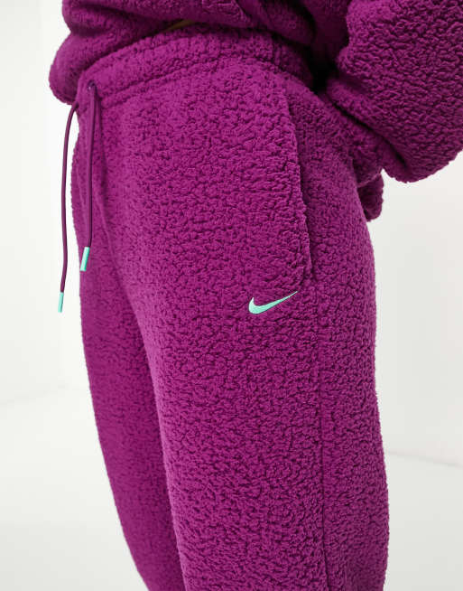 Nike Training Therma-FIT cozy wide joggers in pink