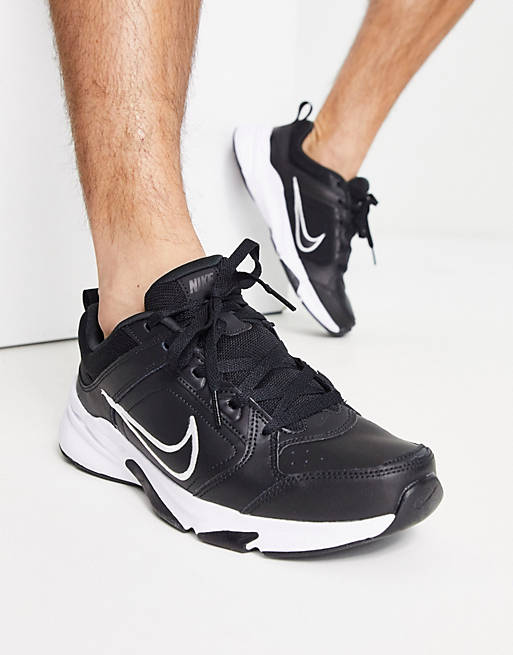 Nike Training Defy All Day trainers in black and white | ASOS