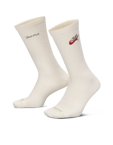Nike Training dragon embroidered socks in cream and red - view 1
