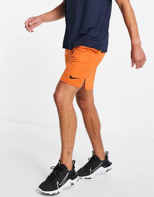 Nike dri fit store shorts orange