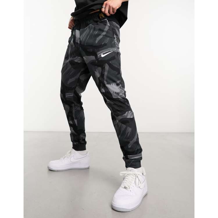 Nike Training Dri Fit camo joggers in black ASOS