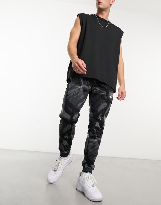 Nike Training Dri-Fit camo joggers in black