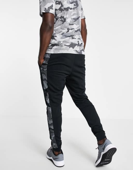 Nike Training Dri-FIT camo print cuffed sweatpants in black | ASOS