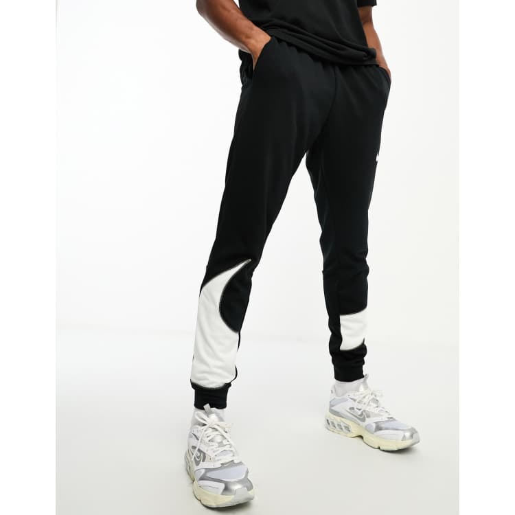 Nike Training Dri FIT Energy Swoosh taper joggers in black ASOS