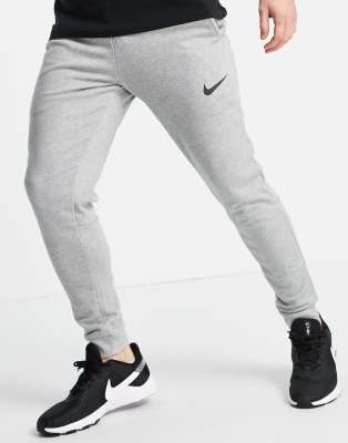 nike light pink joggers