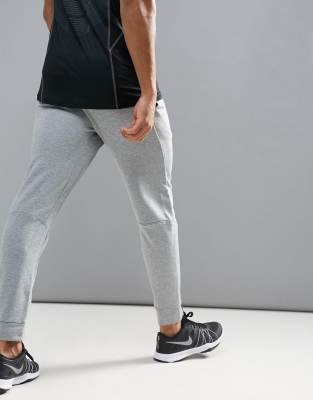 nike training fleece tapered joggers in dark grey