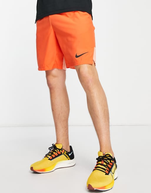 Nike Training Flex woven 9 inch shorts in orange