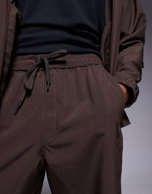Nike Training Dri-FIT Form 9-inch shorts in brown
