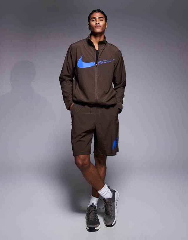 Nike Training Dri-FIT Form 9-inch shorts in brown | ASOS