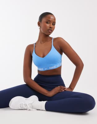 Nike Training Dri-FIT Indy light support sports bra in light blue