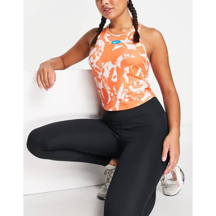 Nike Training Dri-FIT One Luxe Icon Clash all over print tank top in orange