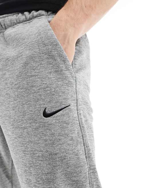 Nike – Training – Dri-Fit – Schmal zulaufende Jogginghose in Grau