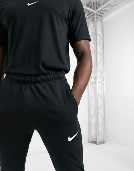Nike Training Dri-Fit - Smaltoelopende fleece joggingbroek in zwart, 3 van 4