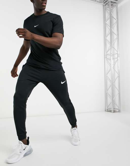 Nike Training Dri FIT Swoosh cuffed fleece sweatpants in black BLACK