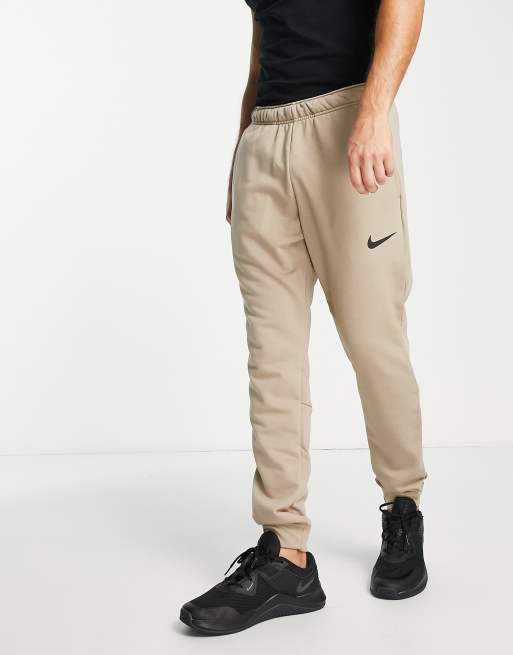 cream nike sweats