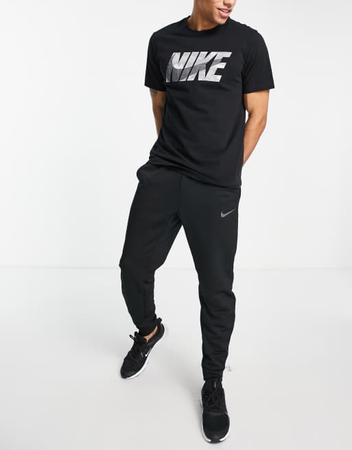 Nike Training Dri FIT T shirt nera con grafica mimetica del logo ASOS