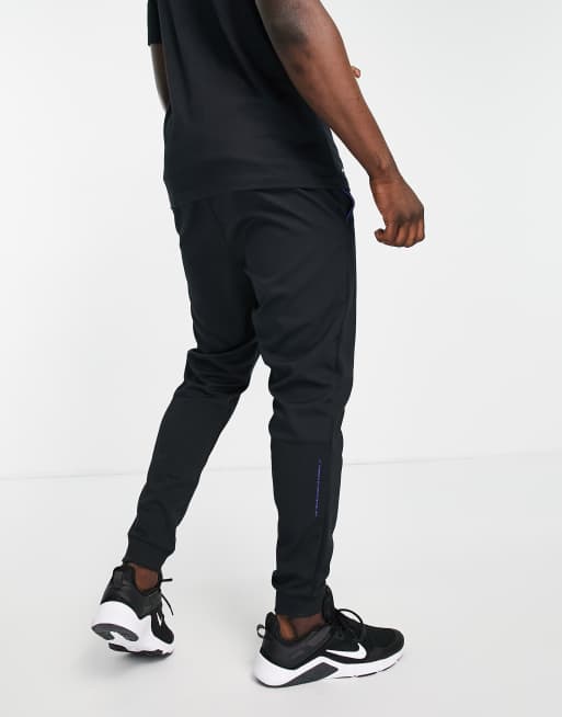 Nike slim fit max tapered leg joggers online