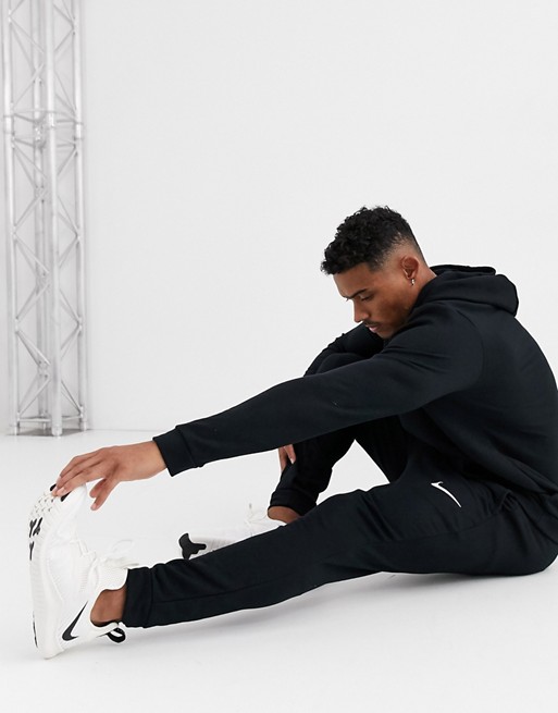 Nike Training Dri-Fit tapered fleece joggers in black