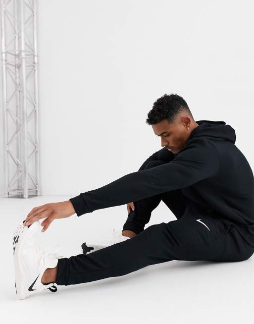 Nike Training Dri-FIT tapered fleece joggers in black | ASOS