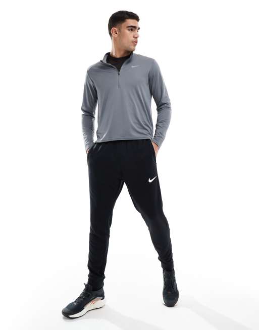 Nike Training Dri Fit tapered fleece joggers in black ASOS