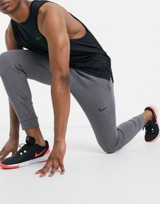 Nike Training Dri-FIT tapered fleece joggers in dark grey