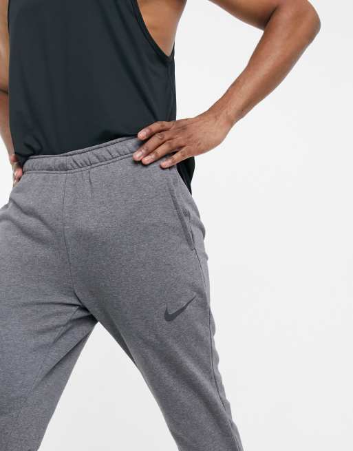 Nike training fleece tapered joggers in store dark grey