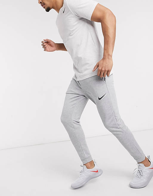 possibility Pleated Whimsical Nike Training Dri-Fit tapered fleece joggers in grey | ASOS